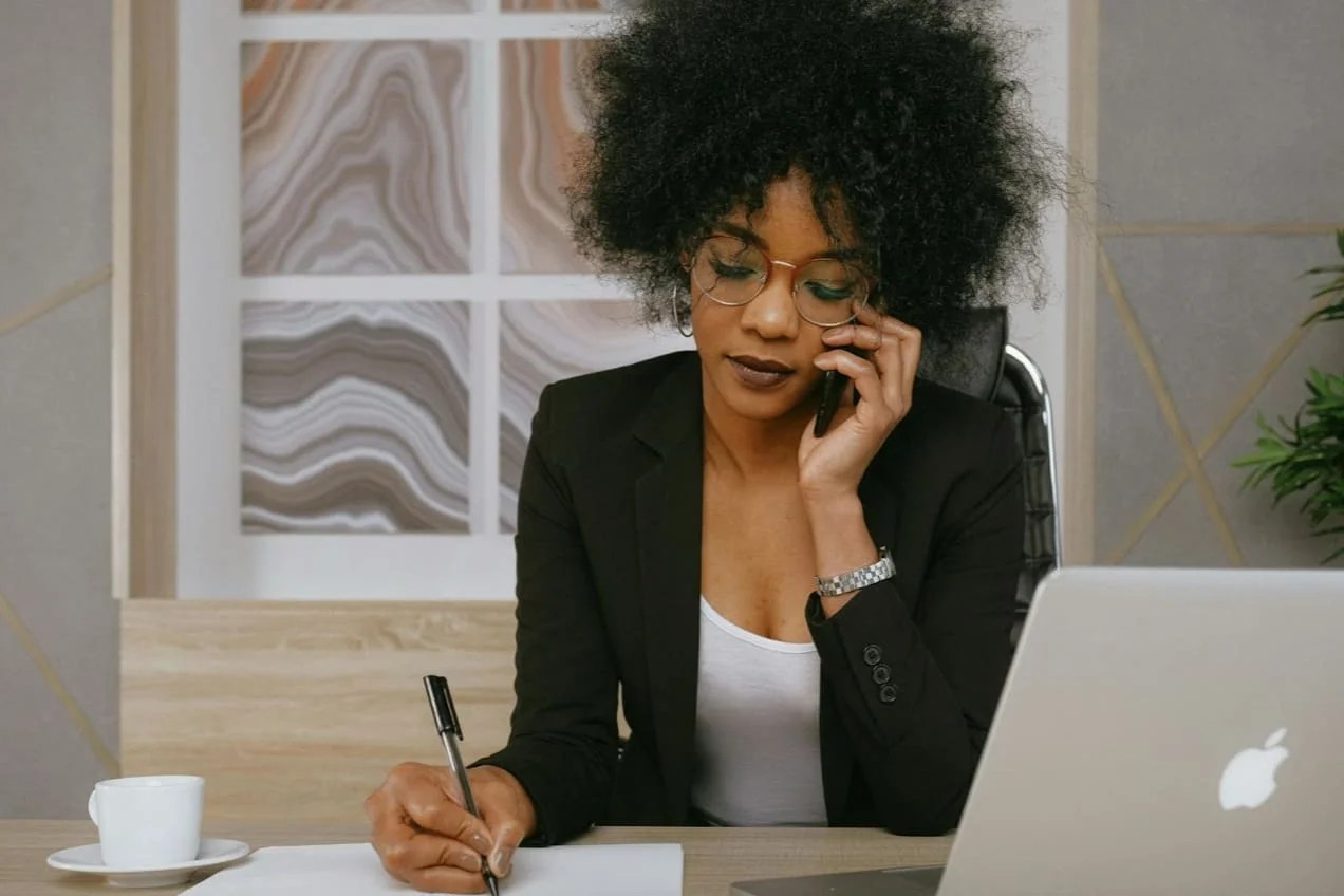 Woman working on administrative tasks in office.