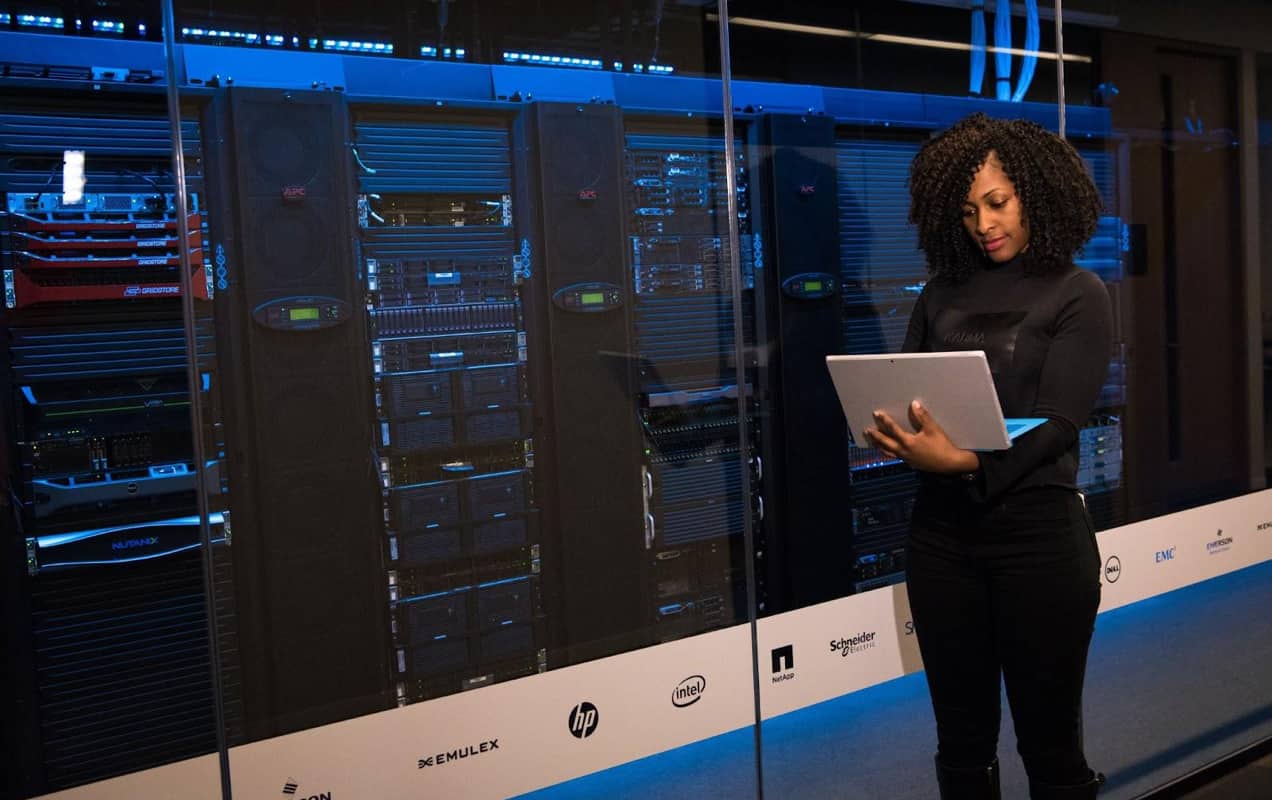 woman working in a server room