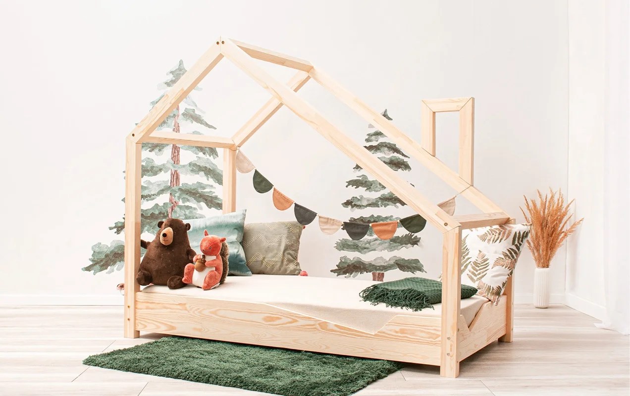 beautiful wooden house bed with woodland stuffed animals